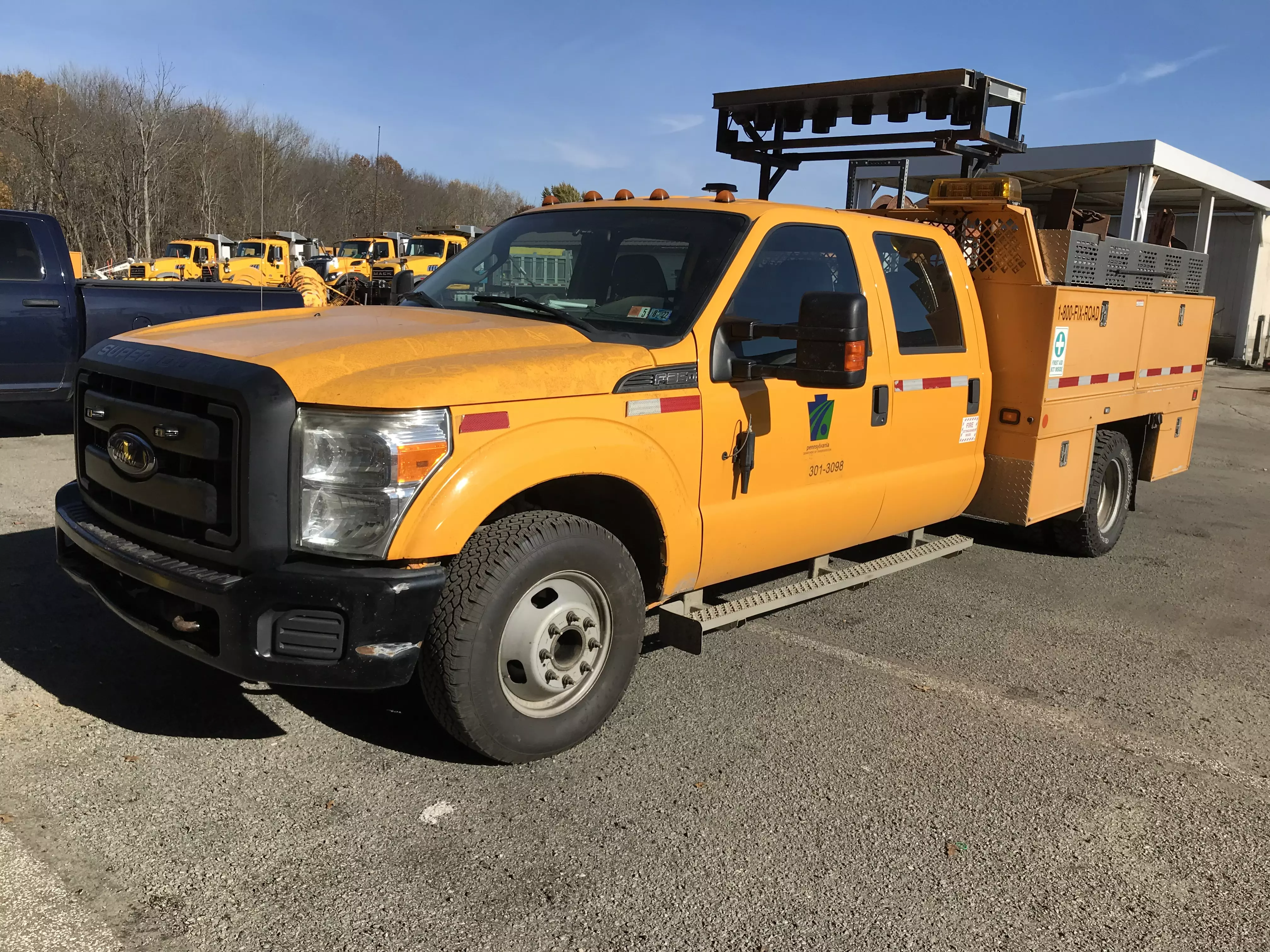 An image of a yellow PennDOT crew cab pickup truck that is now repaired from the parts taken from other PennDOT vehicles.